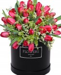 Red tulips - flower in a box